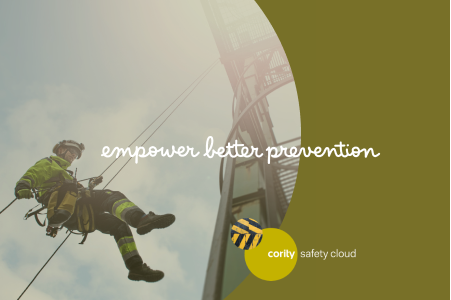 A worker in safety gear rappels down a structure with the text empower better prevention, behavior-based safety, and Corily Safety Cloud.