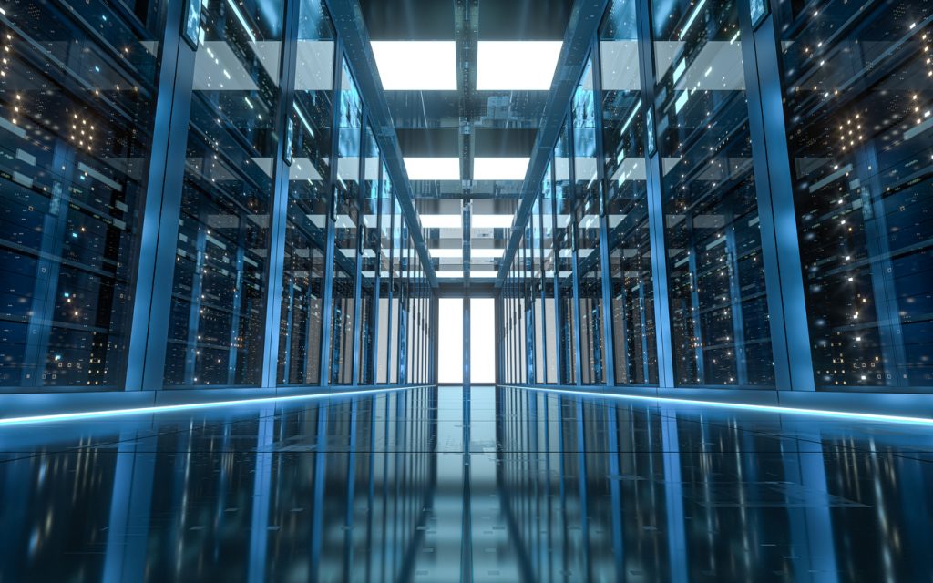 A modern, brightly lit server room with rows of servers and a reflective floor, designed to meet FedRAMP Ready Status requirements.