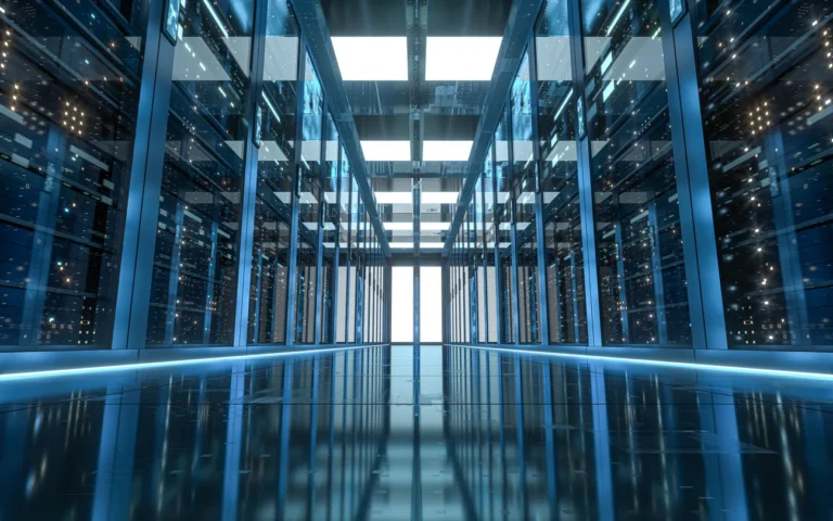 A modern, brightly lit server room with rows of servers and a reflective floor, designed to meet FedRAMP Ready Status requirements.