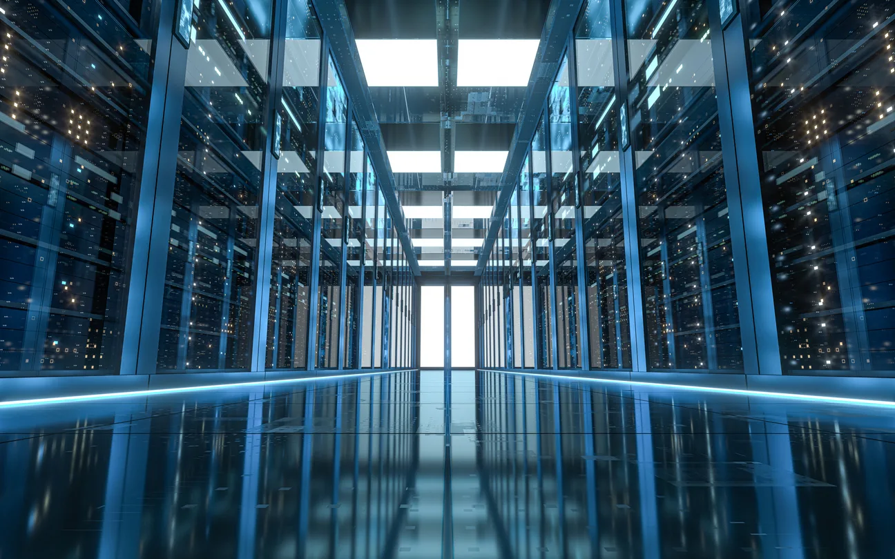 A modern, brightly lit server room with rows of servers and a reflective floor, designed to meet FedRAMP Ready Status requirements.