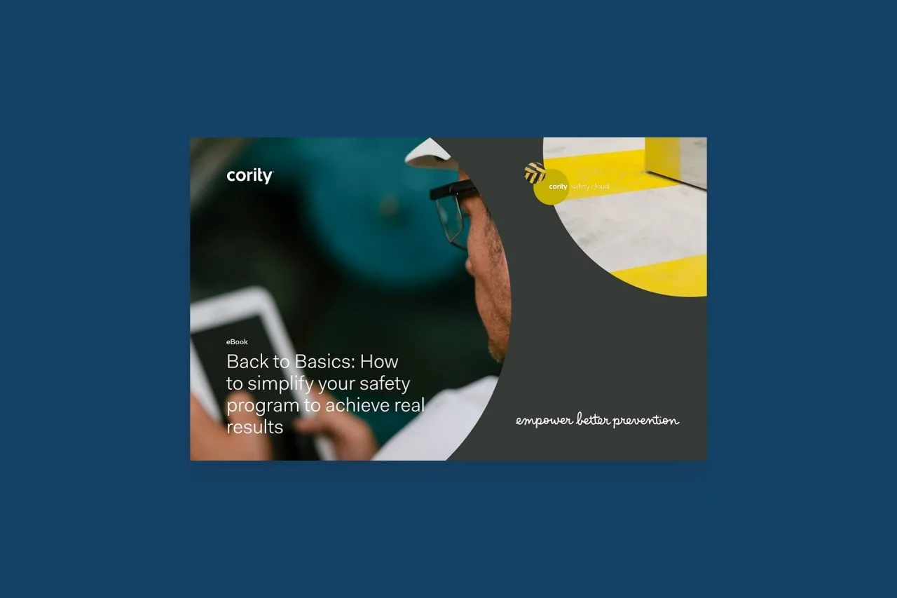 A person in glasses looks at a tablet. Text: Simplify Your Safety Program and drive real results with ease.