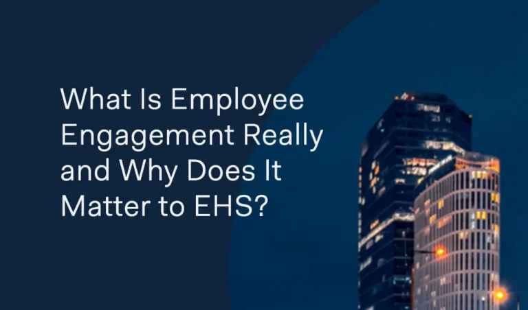 Text reads What Is Employee Engagement Really and Why Does It Matter to EHS? with buildings in the background, exploring what employee engagement means and its impact on EHS programs.