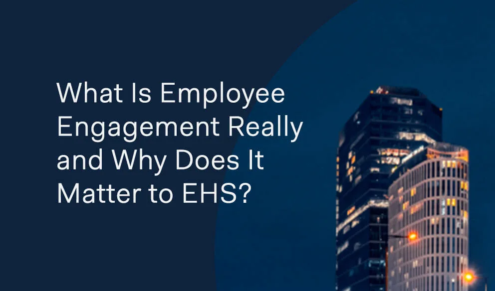 Text reads What Is Employee Engagement Really and Why Does It Matter to EHS? with buildings in the background, exploring what employee engagement means and its impact on EHS programs.