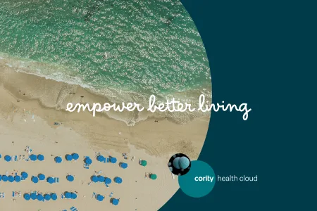 Aerial view of a beach with umbrellas, ocean waves, and text: empower better living, cority health cloud for workplace safety and heat management technology.