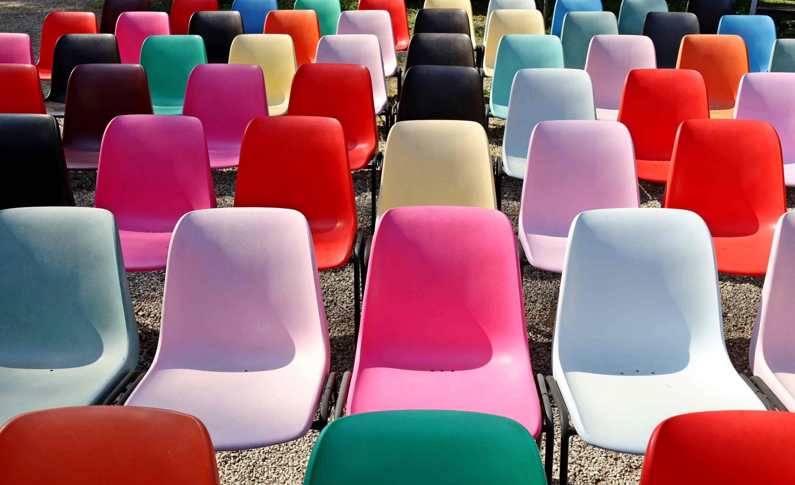 sustainable companies blog colorful chairs pink cority
