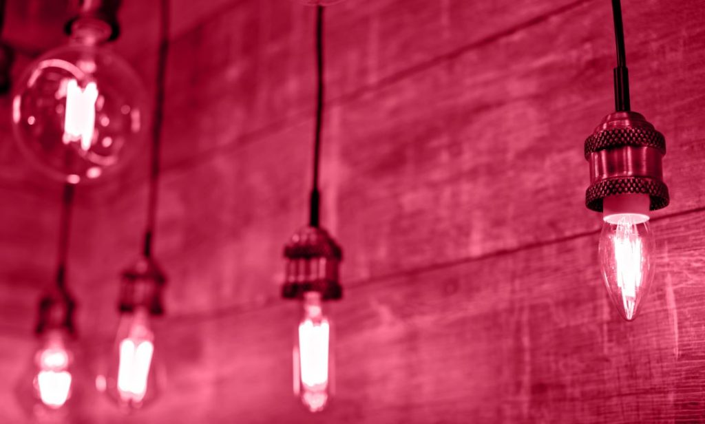 choosing esg reporting framework blog lights pink cority