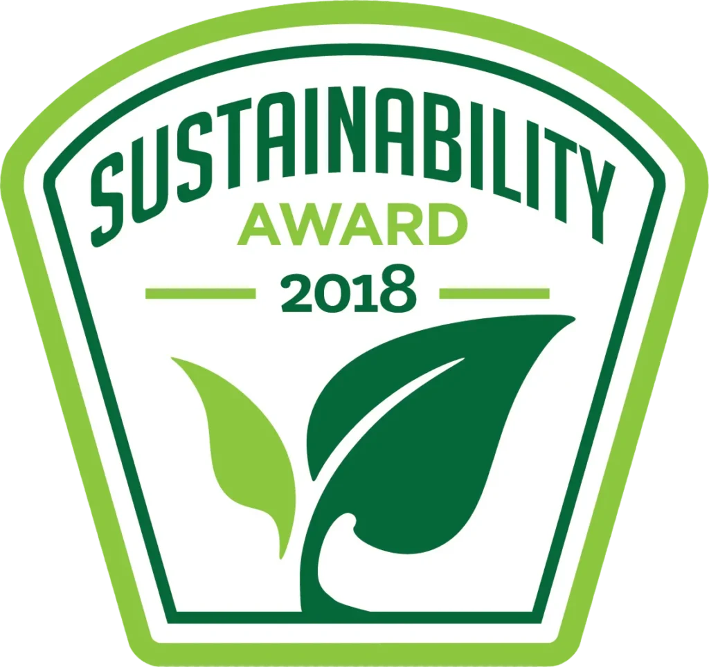 A green and white badge with the words Sustainability Award 2018 above an illustration of two green leaves, symbolizing environmental achievement.