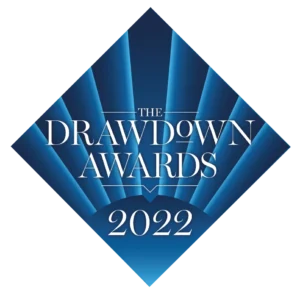 Logo for The Drawdown Awards 2022, featuring white text on a blue diamond-shaped background with radiating light blue beams.