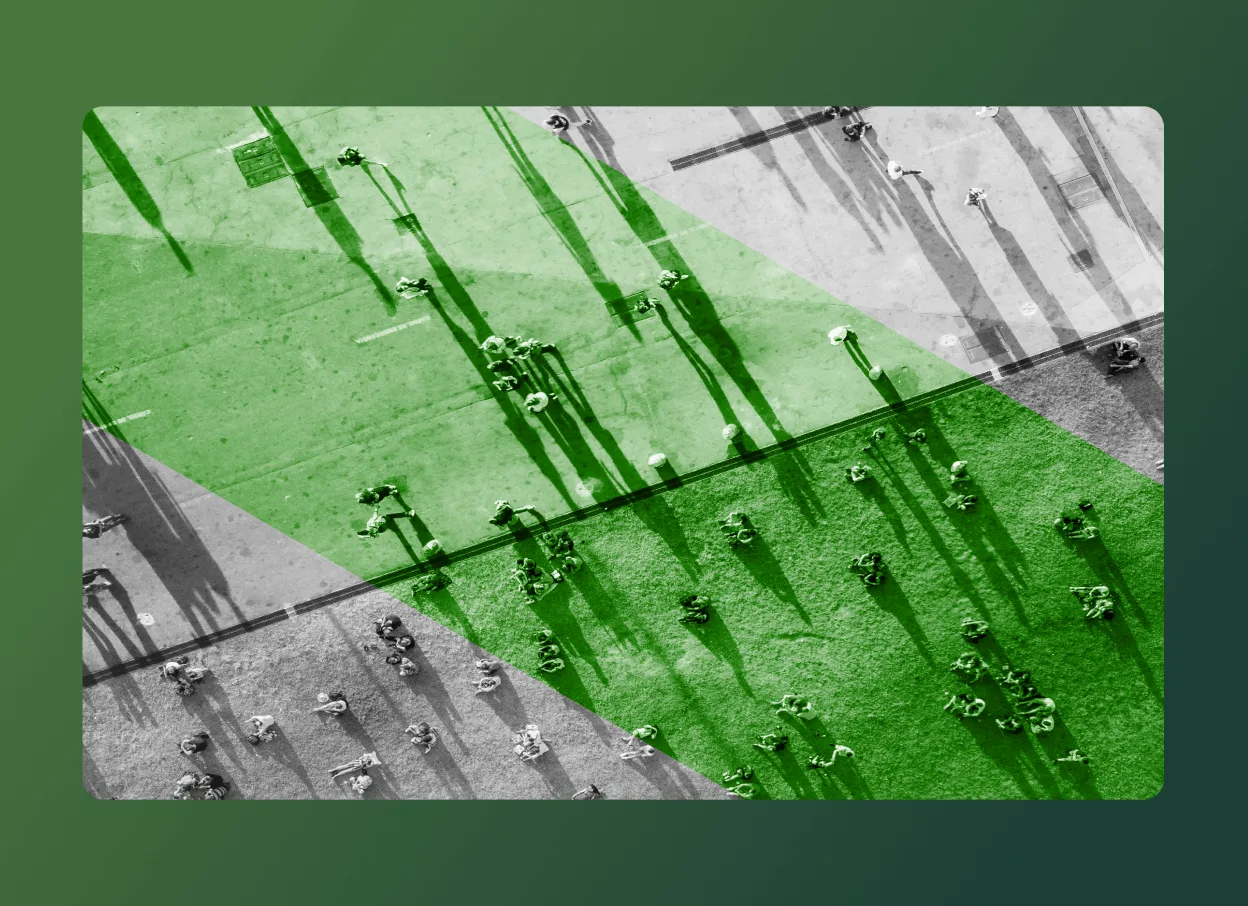 Aerial view of people on a sidewalk casting long shadows, with two green transparent shapes overlaying the image. The abstract scene hints at environmental management solutions through its creative composition and use of color.