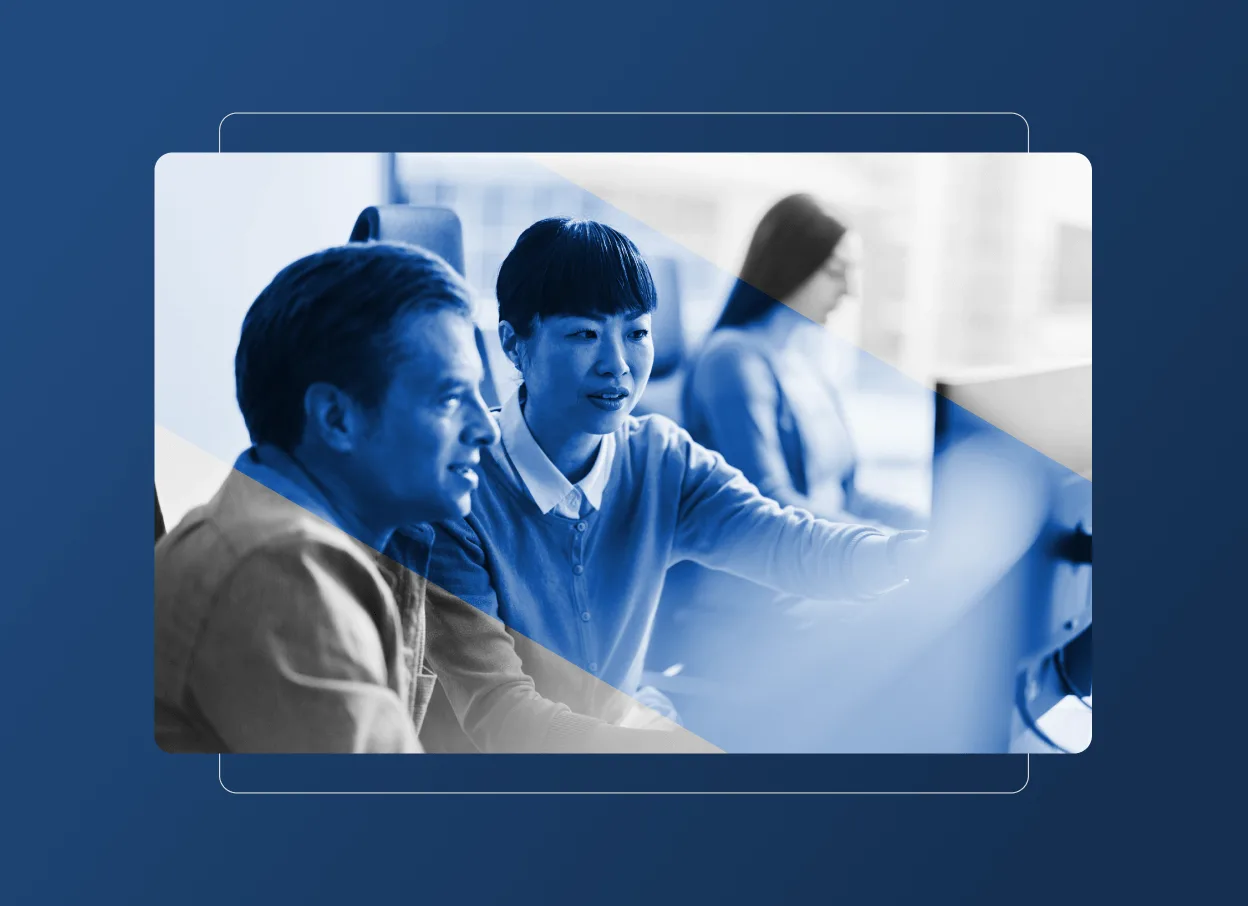 Two people sit at a computer, collaborating and looking at the screen, with another person working in the background. The image features a blue overlay and a modern, digital frame—perfect for presentations about teamwork in the hospital industry.