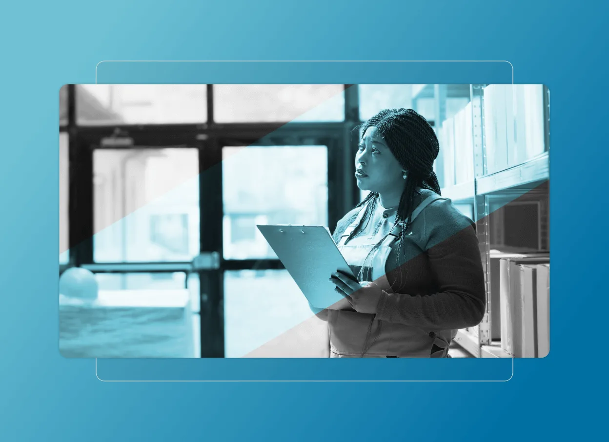 A woman stands in a library or office, holding a clipboard and looking toward shelves. The image has a blue overlay with geometric patterns, echoing the organized style of an Accordion Section. Large windows brighten the background.