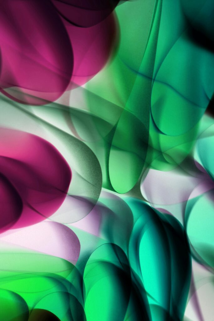 Abstract image featuring overlapping translucent shapes in shades of green, magenta, and teal, flowing together with smooth gradients and depth—evoking a sense of movement that aligns with action and visualizes no-regret metrics in dynamic form.