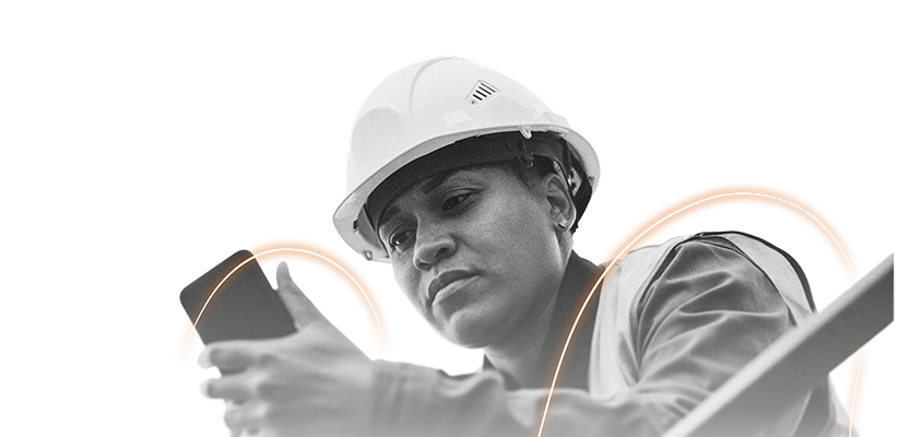 A person wearing a hard hat and safety vest looks intently at a smartphone, appearing focused and engaged, as an EHS AI-powered light arc graphic glows in the background.