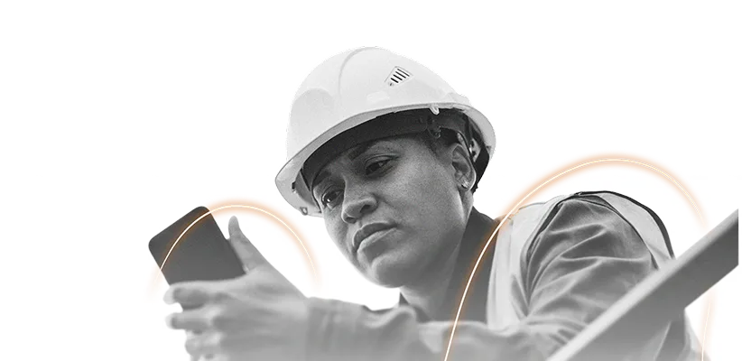A person wearing a hard hat and safety vest looks intently at a smartphone, appearing focused and engaged, as an EHS AI-powered light arc graphic glows in the background.
