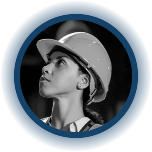 A woman wearing a hard hat and safety vest looks upward with a focused expression, set against a dark background and framed by a blue circular border, embodying the dedication seen in users of EHS software.